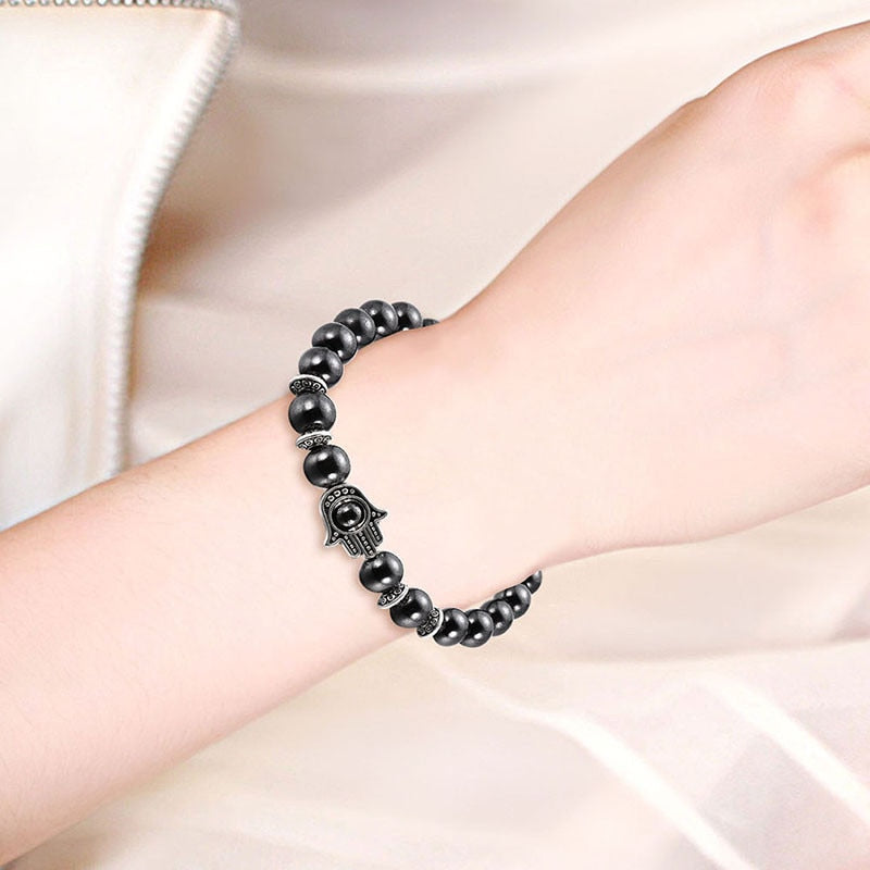 Bracelete Hamsa Mão de Fátima em Hematita Natural - Força e Proteção Pessoal
